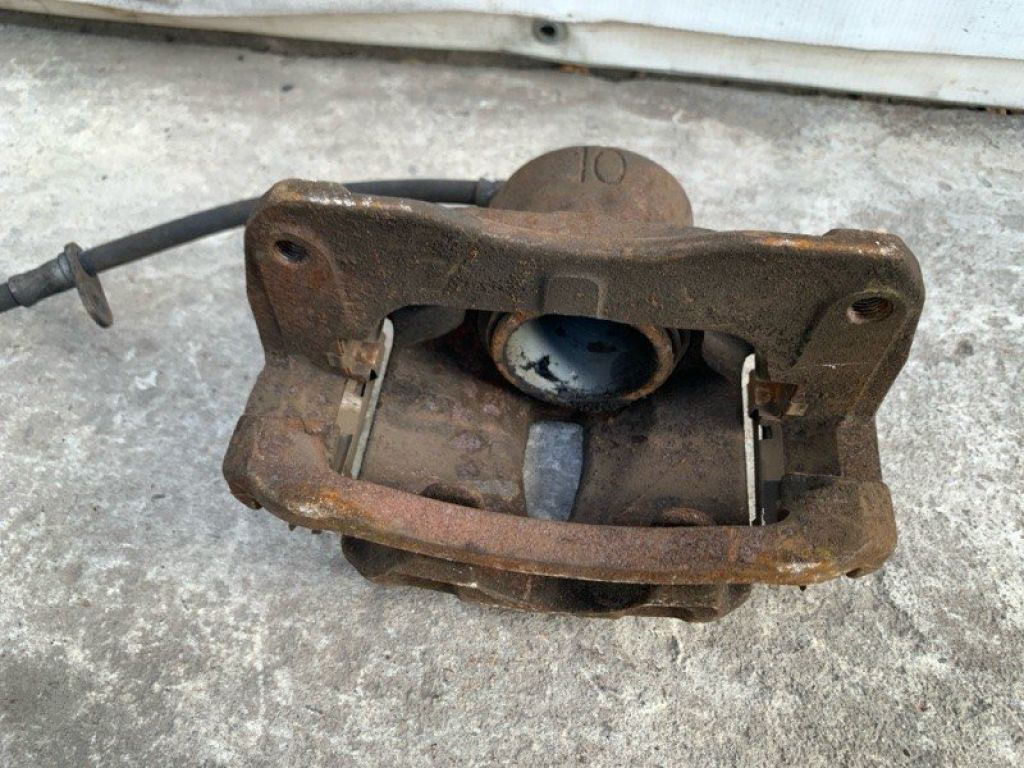 47750-08030 | Суппорт тормозной передн. лев. TOYOTA SIENNA 03-10 - Фото 5