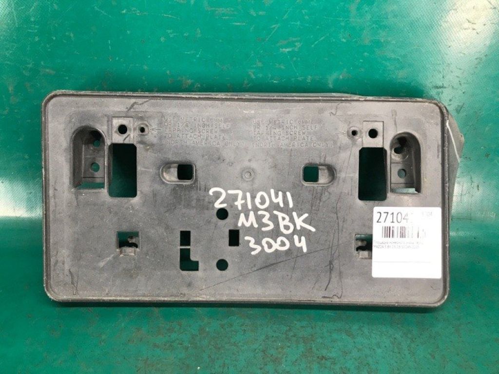 BN8K-50-170 | Майданчик номерного знаку передн. MAZDA 3 BK 03-08