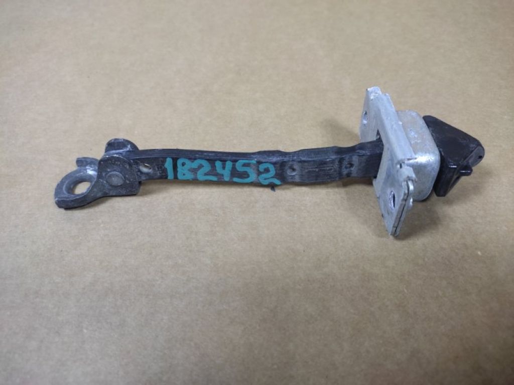 BBM4-58-270B | Обмежувач дверей передн. лів. MAZDA 3 BL 09-13