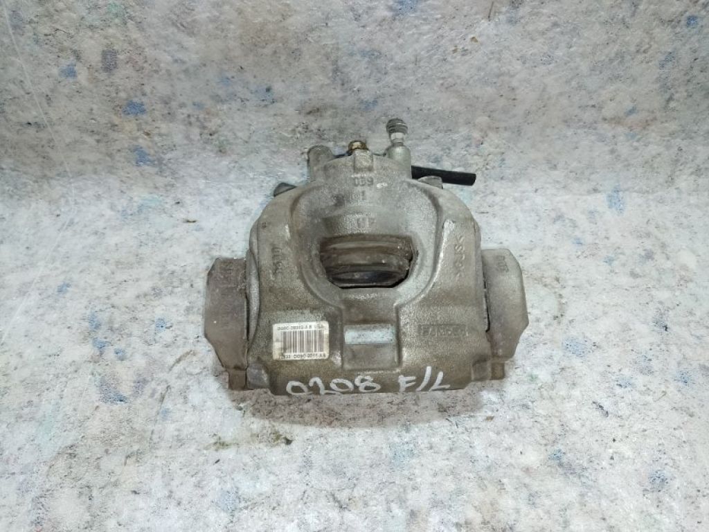 DG9Z-2B121-A | Супорт гальмівний передн. лів. FORD FUSION 14-