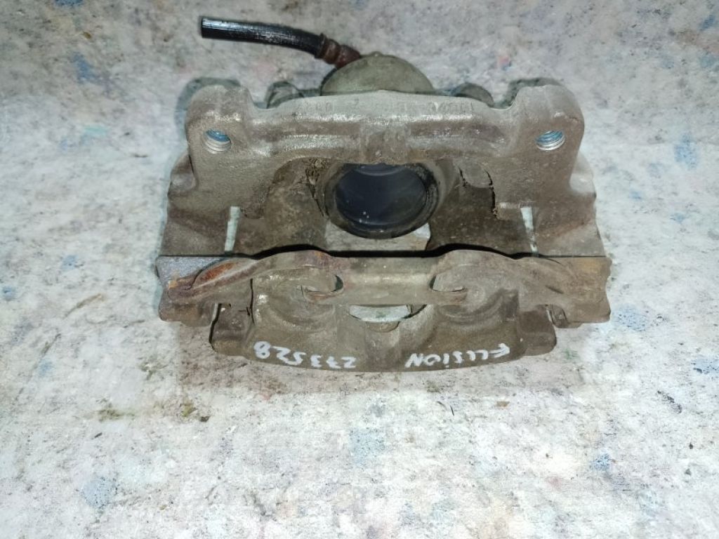 DG9Z-2B121-A | Супорт гальмівний передн. лів. FORD FUSION 14- - Фото 2