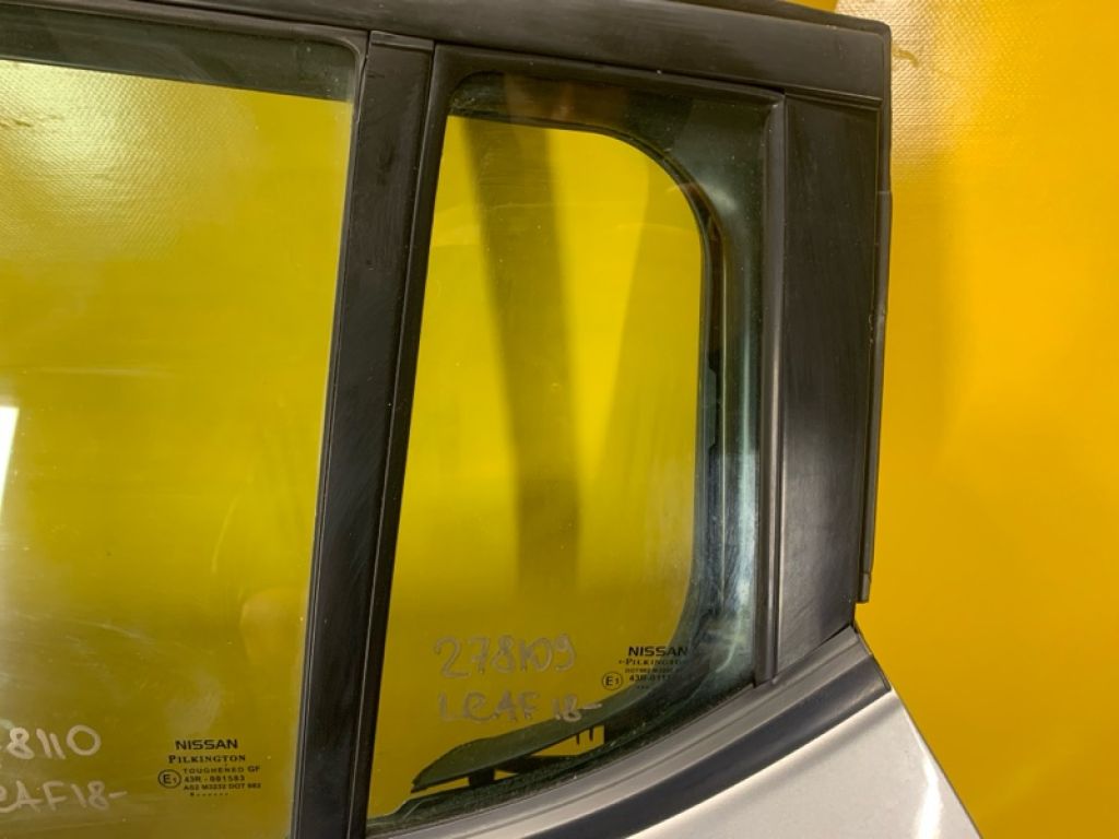 82221-5SF1A | Стекло двери глухое задн. лев. NISSAN LEAF 18-