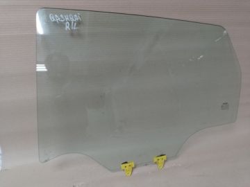 Скло дверей задн. лів. NISSAN QASHQAI 07-14