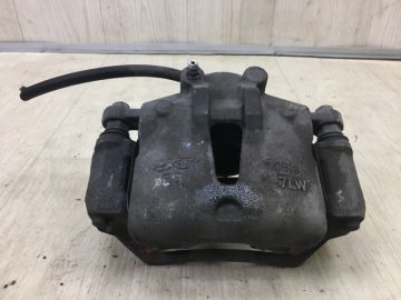 Суппорт тормозной передн. лев. HYUNDAI I30 FD 07-12