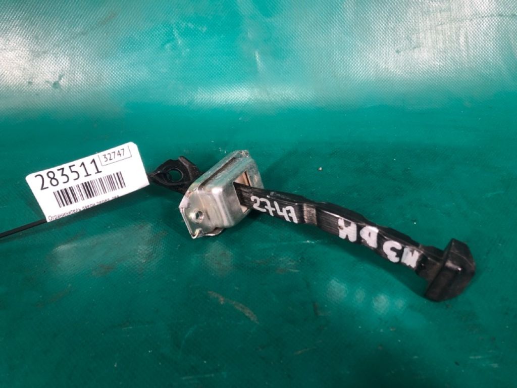 BHN9-58-270 | Ограничитель двери передн. лев. MAZDA 3 BM 13-19