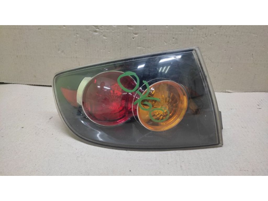 BN8R-51-160D | Фонарь наружный лев. MAZDA 3 BK 03-08