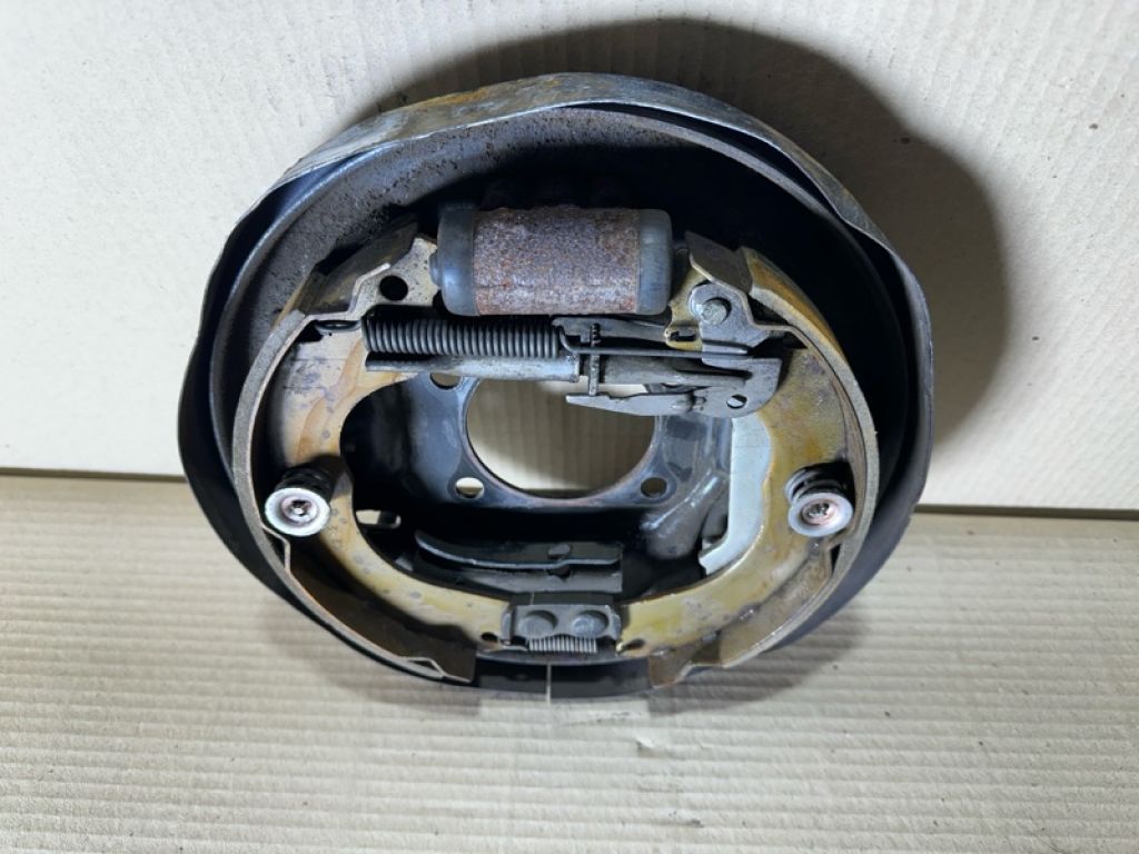 44010-EE30A | Тормозной механизм задн. лев. NISSAN TIIDA/VERSA C11 04-11 - Фото 2
