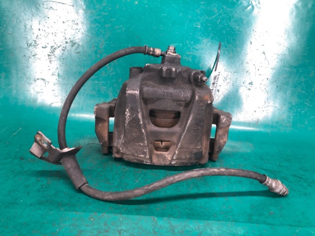 5N0 615 123 | Суппорт тормозной передн. лев. VOLKSWAGEN PASSAT B7 11-15