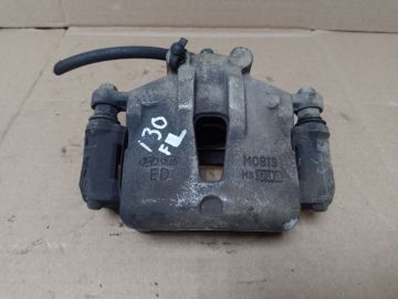 Суппорт тормозной передн. лев. HYUNDAI I30 FD 07-12