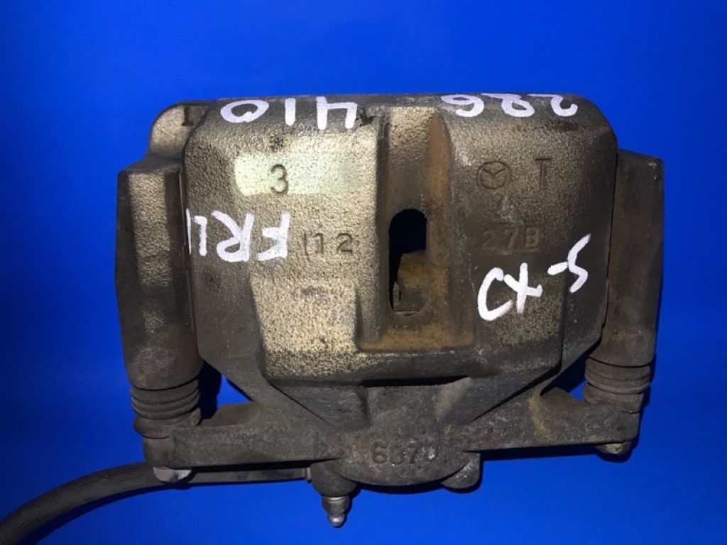 K0Y1-33-99Z | Суппорт тормозной передн. лев. MAZDA CX-5 (KE) 11-17