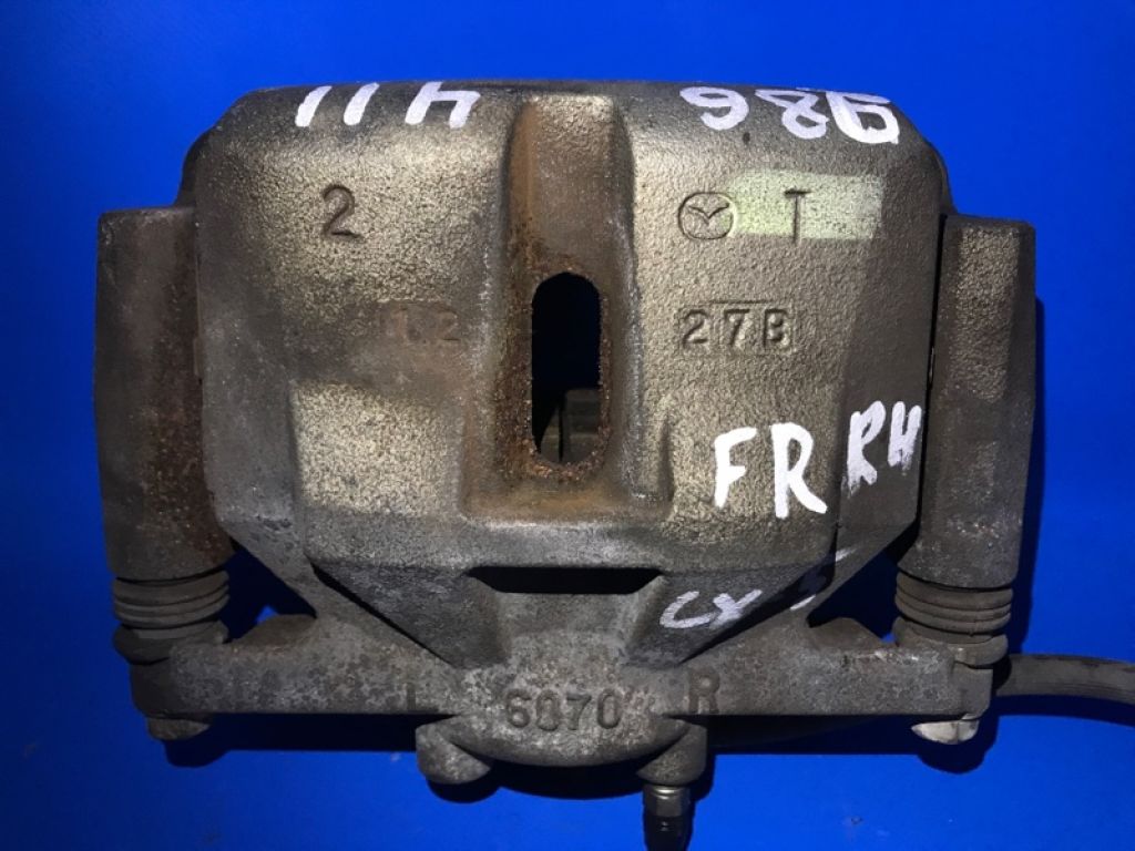 K0Y1-33-98Z | Супорт гальмівний передн. прав. MAZDA CX-5 (KE) 11-17