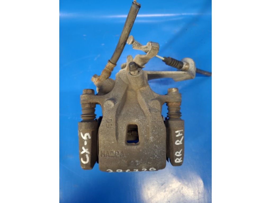 K0Y1-26-98ZA | Суппорт тормозной задн. прав. MAZDA CX-5 (KE) 11-17