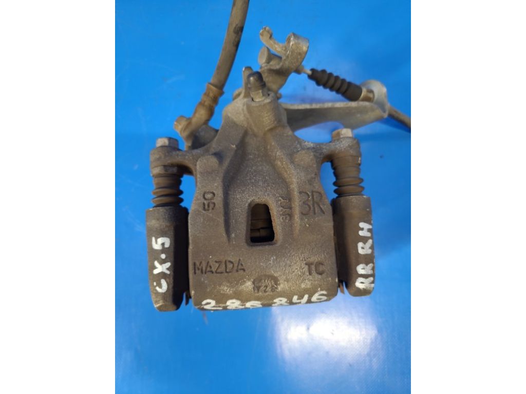 K0Y1-26-98ZA | Суппорт тормозной задн. прав. MAZDA CX-5 (KE) 11-17