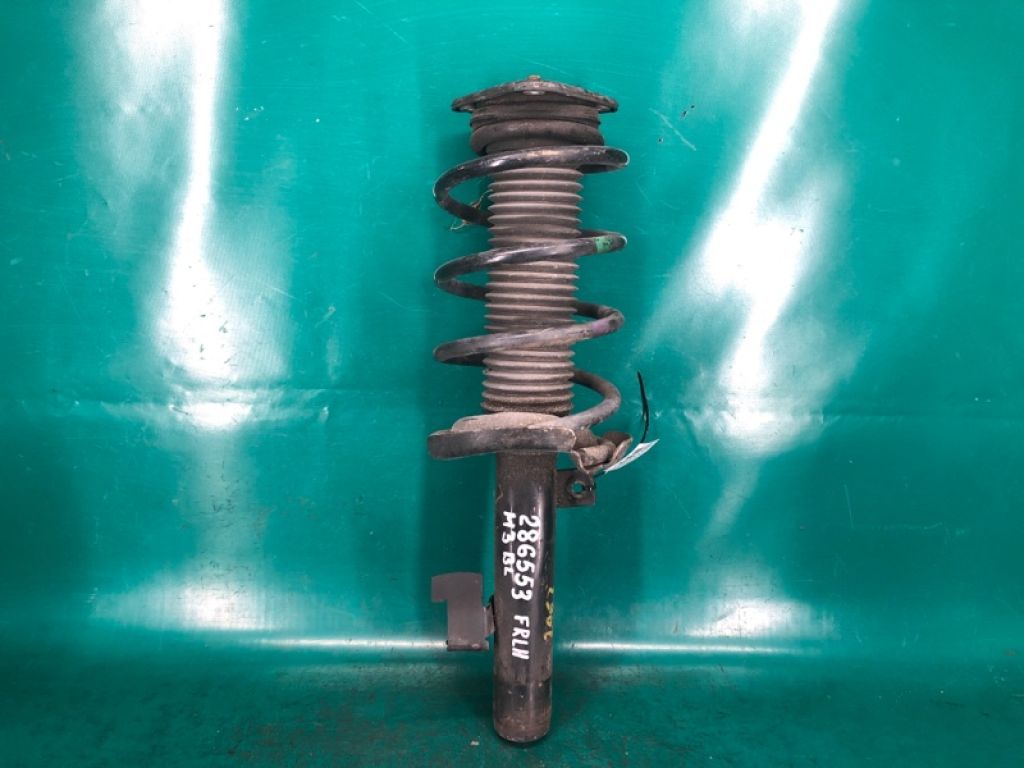 BBM2-34-900C | Амортизатор передн. лев. MAZDA 3 BL 09-13
