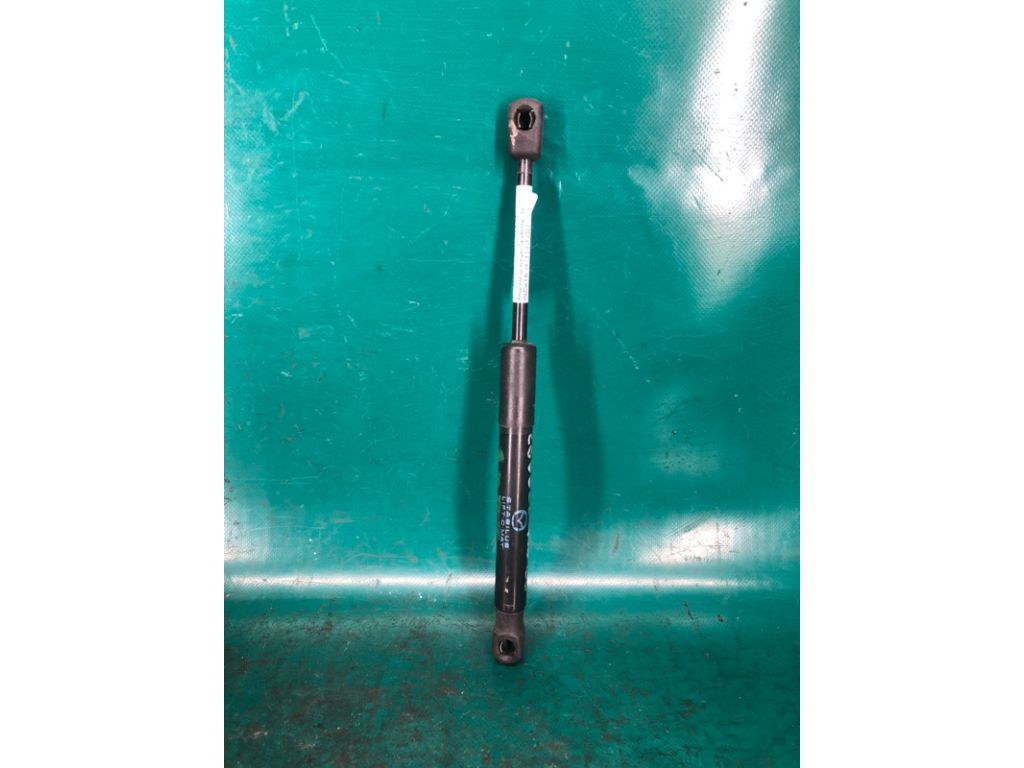 BBM4-56-930A | Амортизатор крышки багажника лев. MAZDA 3 BL 09-13