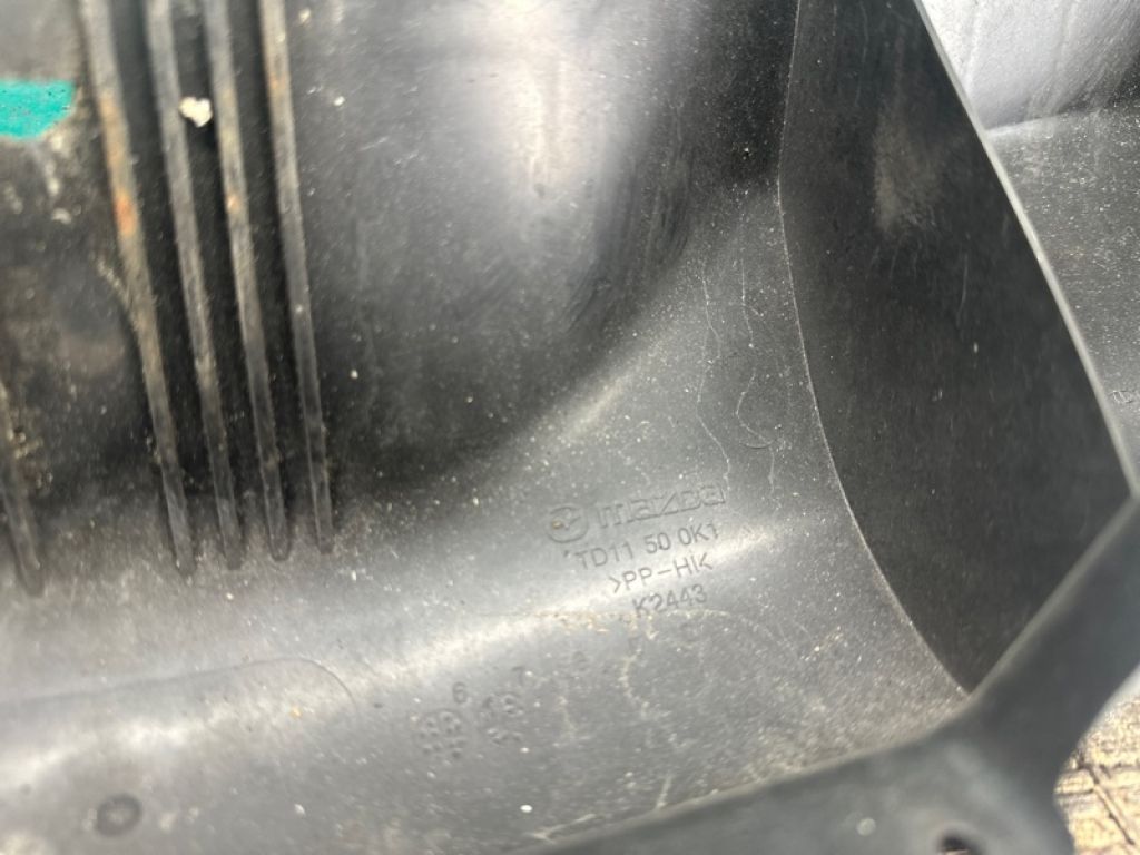 TD11-50-0K1C | Кронштейн решітки радіатора MAZDA CX-9 06-16 - Фото 4