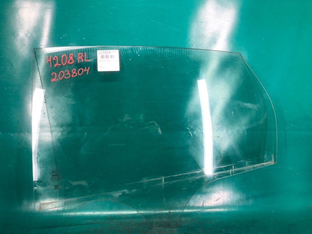 CP9Z-5825713-A | Стекло двери задн. лев. FORD FOCUS 10-18
