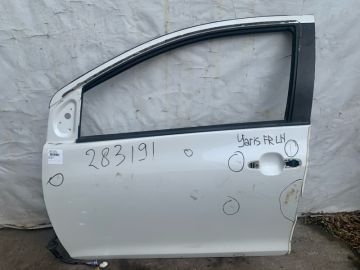 Двері передн. лів. TOYOTA YARIS 05–11