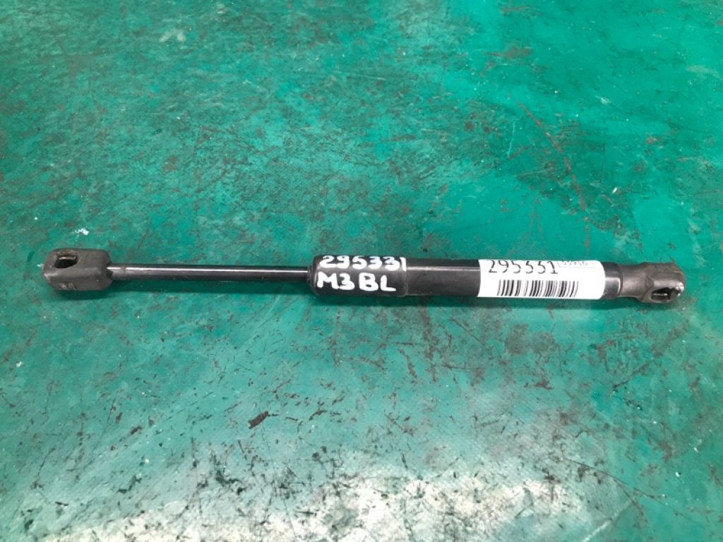 BBM4-56-930A | Амортизатор кришки багажника лів. MAZDA 3 BL 09-13