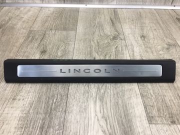 Накладка порога внутрішня передн. лів. LINCOLN MKZ 13-20