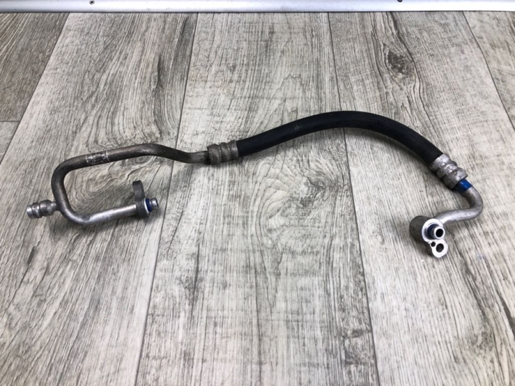 97762-1M100 | Трубка кондиціонеру KIA FORTE/CERATO TD 08-13