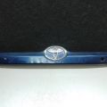 76801-02130-J0 | Панель подсветки номера TOYOTA MATRIX 02-08