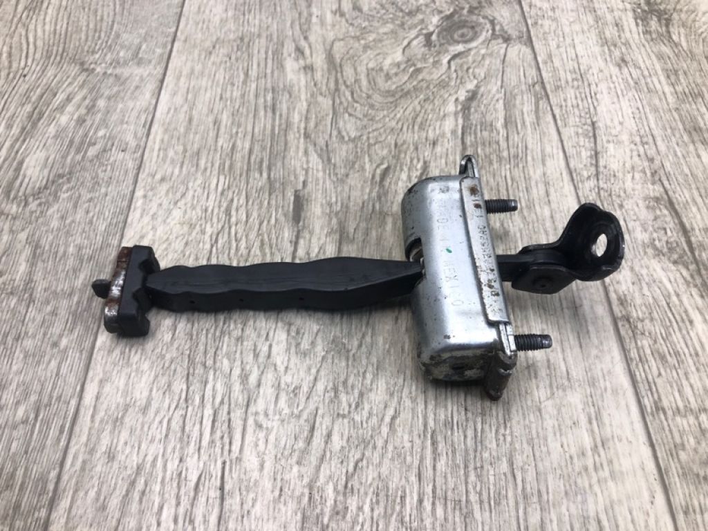 DP5Z-5423552-B | Обмежувач дверей передн. LINCOLN MKZ 13-20