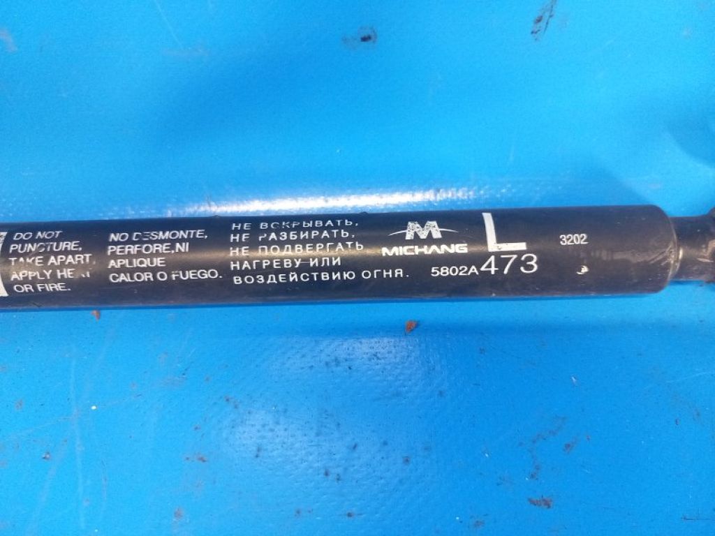 5802A473 | Амортизатор крышки багажника лев. MITSUBISHI MIRAGE 13- - Фото 2