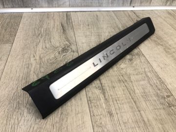 Накладка порога внутрішня передн. лів. LINCOLN MKZ 13-20