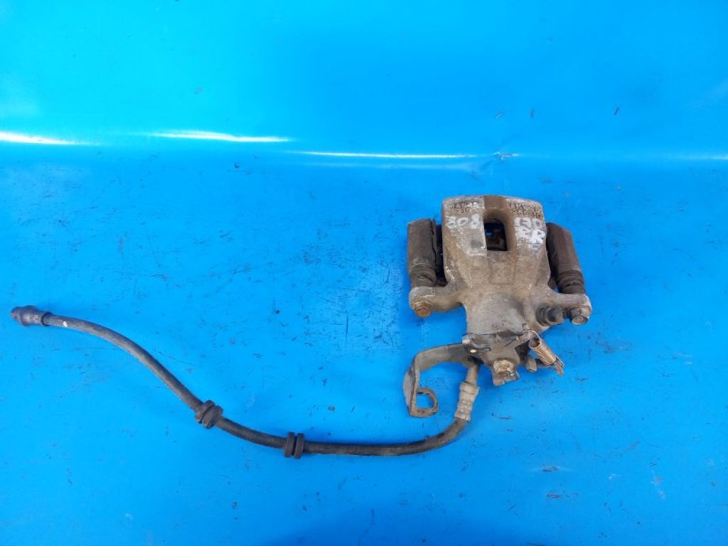 34216860557 | Супорт гальмівний задн. лів. MINI COOPER (F57) 15-