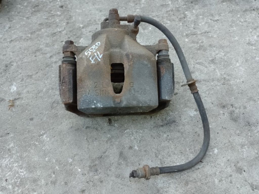 47750-06070 | Суппорт тормозной передн. лев. TOYOTA CAMRY 30 02-06