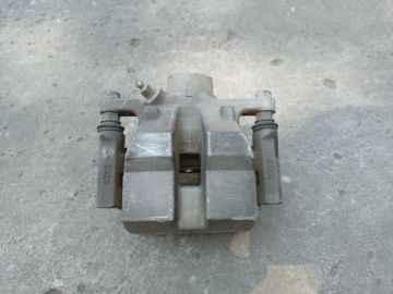 Суппорт тормозной задн. лев. TOYOTA SIENNA 11-16