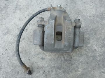 Суппорт тормозной задн. лев. TOYOTA TUNDRA 07-13