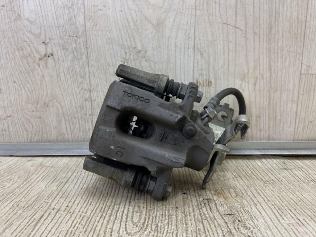 4785047110 | Суппорт тормозной задн. лев. TOYOTA PRIUS 16-