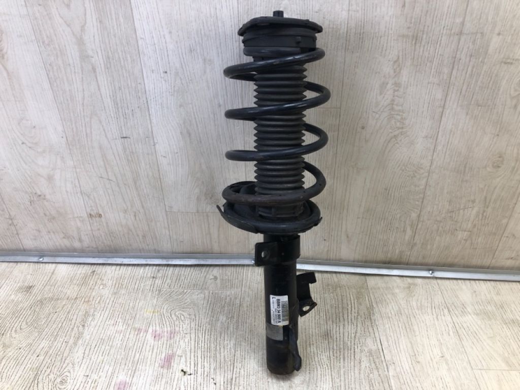 BBM3-34-900A | Амортизатор передн. лев. MAZDA 3 BL 09-13