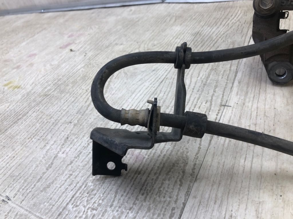 4605A257 | Суппорт тормозной передн. лев. MITSUBISHI OUTLANDER XL 05-13 - Фото 6