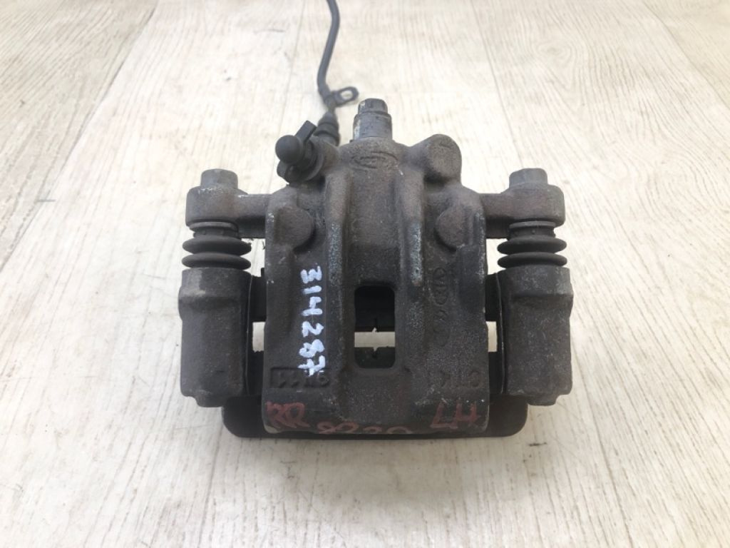 582101M300 | Суппорт тормозной задн. лев. KIA FORTE/CERATO TD 08-13