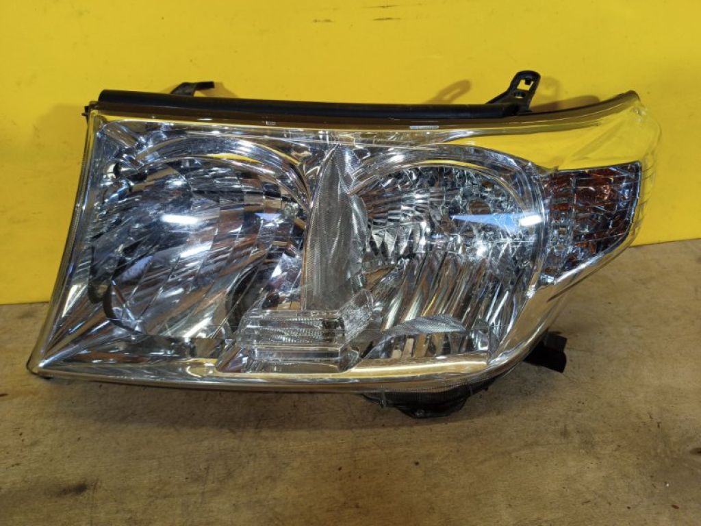 8117060C50 | Фара лів. TOYOTA LAND CRUISER 200 08-21