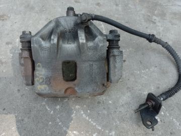 Суппорт тормозной передн. лев. HYUNDAI TUCSON 04-10