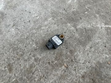 Датчик удара передн. MITSUBISHI OUTLANDER XL 05-13