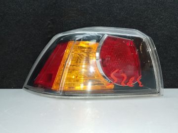 Фонарь наружный лев. MITSUBISHI LANCER X 10 07-15