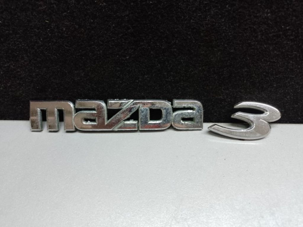 BN8V-51-710A | Эмблема задн. MAZDA 3 BK 03-08
