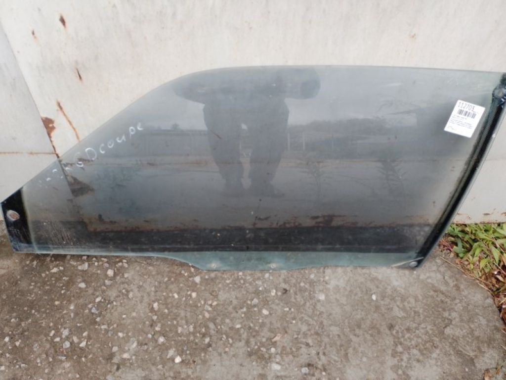 G225-59-510E | Скло дверей передн. лів. MAZDA 626 GD 87-91