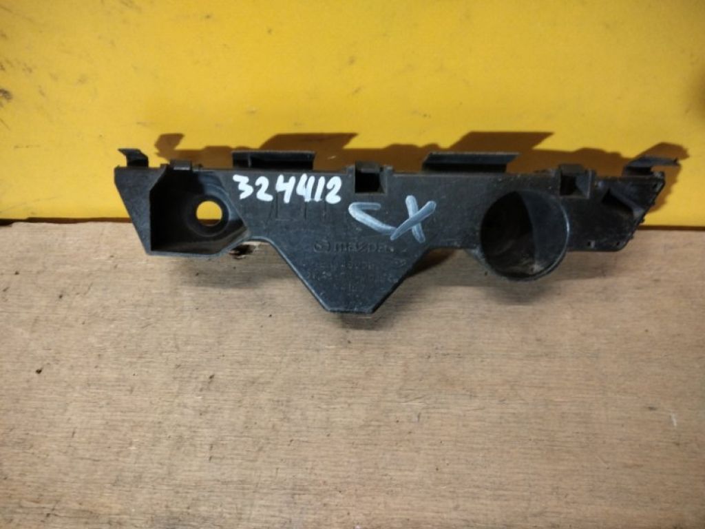 EH14500U1 | Кронштейн переднего бампера лев. MAZDA CX-7 06-12