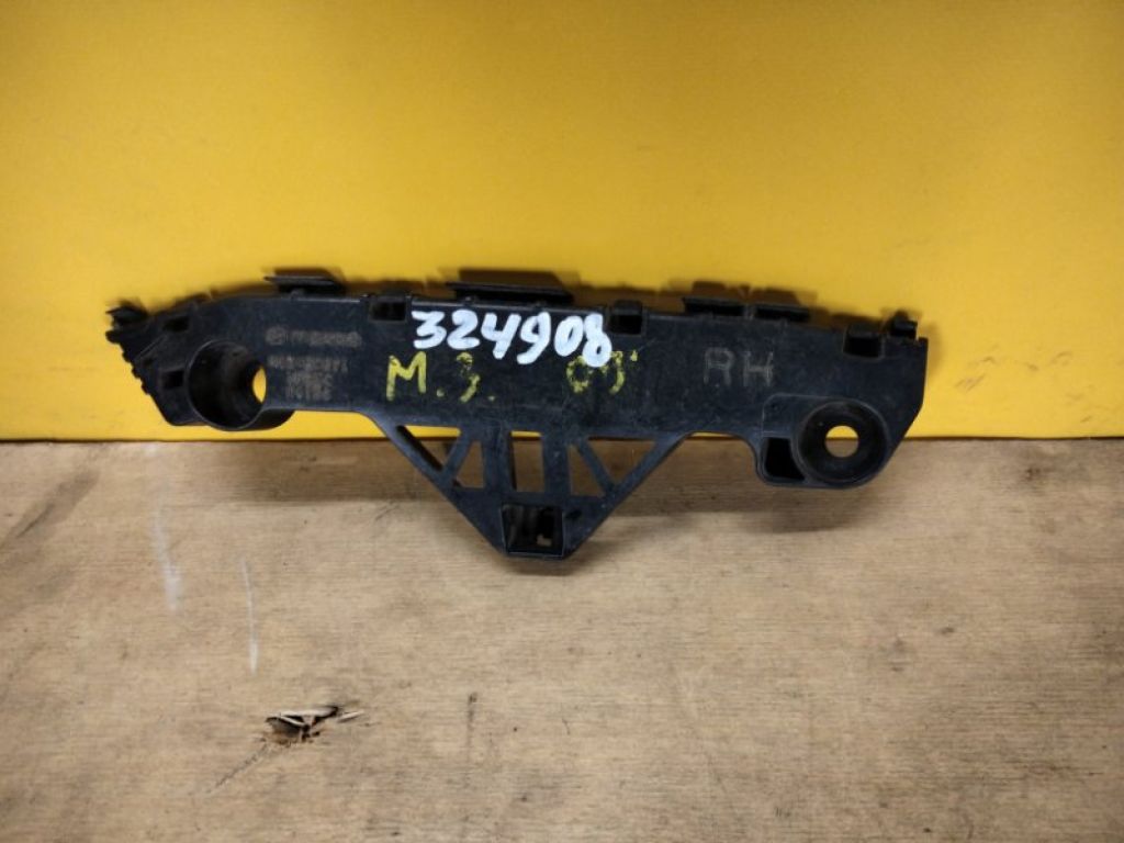 BBM4500T1 | Кронштейн переднего бампера прав. MAZDA 3 BL 09-13