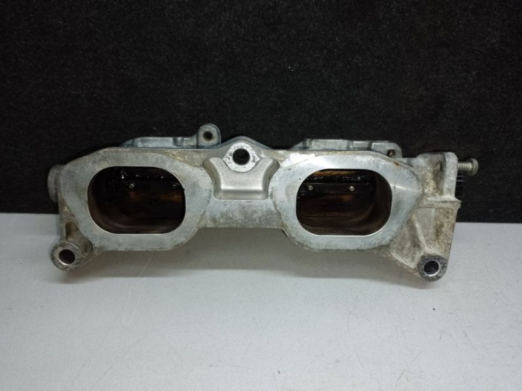 14111AA000 | Коллектор впускной лев. SUBARU IMPREZA 11-17