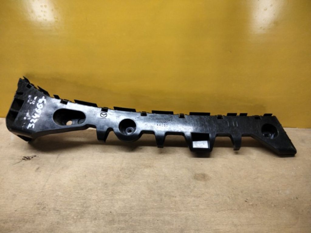 GJR9502J1 | Кронштейн заднього бампера лів. MAZDA 6 GJ 12-