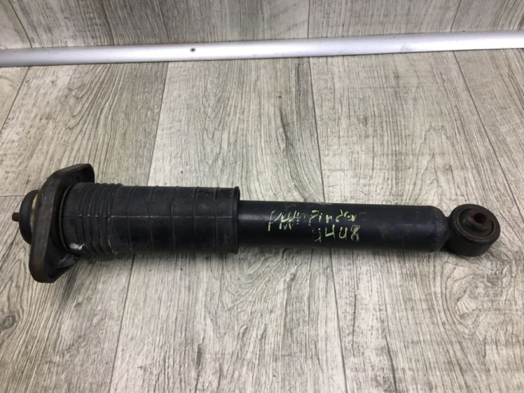 E6210-9NF0A | Амортизатор задн. NISSAN PATHFINDER R52 12-21