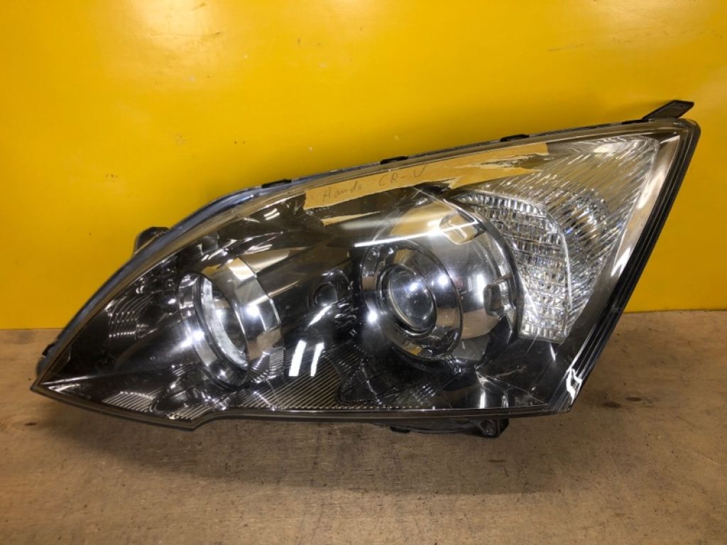 33150SWWG1 | Фара лев. HONDA CRV 06-12