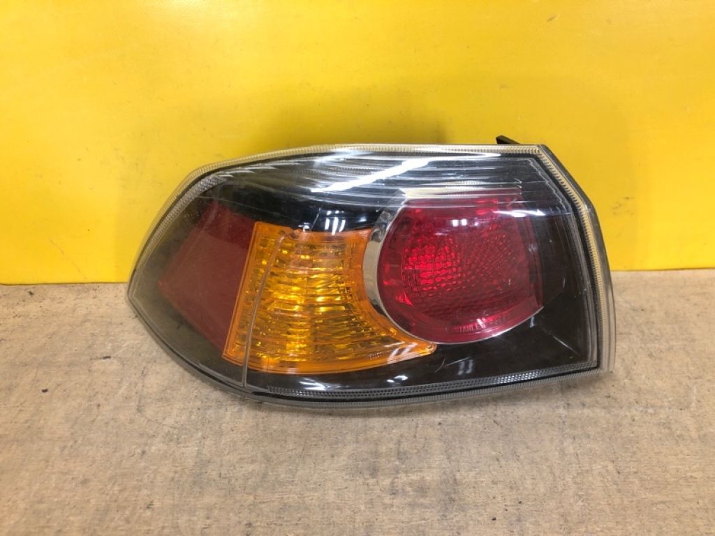 8330A621 | Фонарь наружный лев. MITSUBISHI LANCER X 10 15-17
